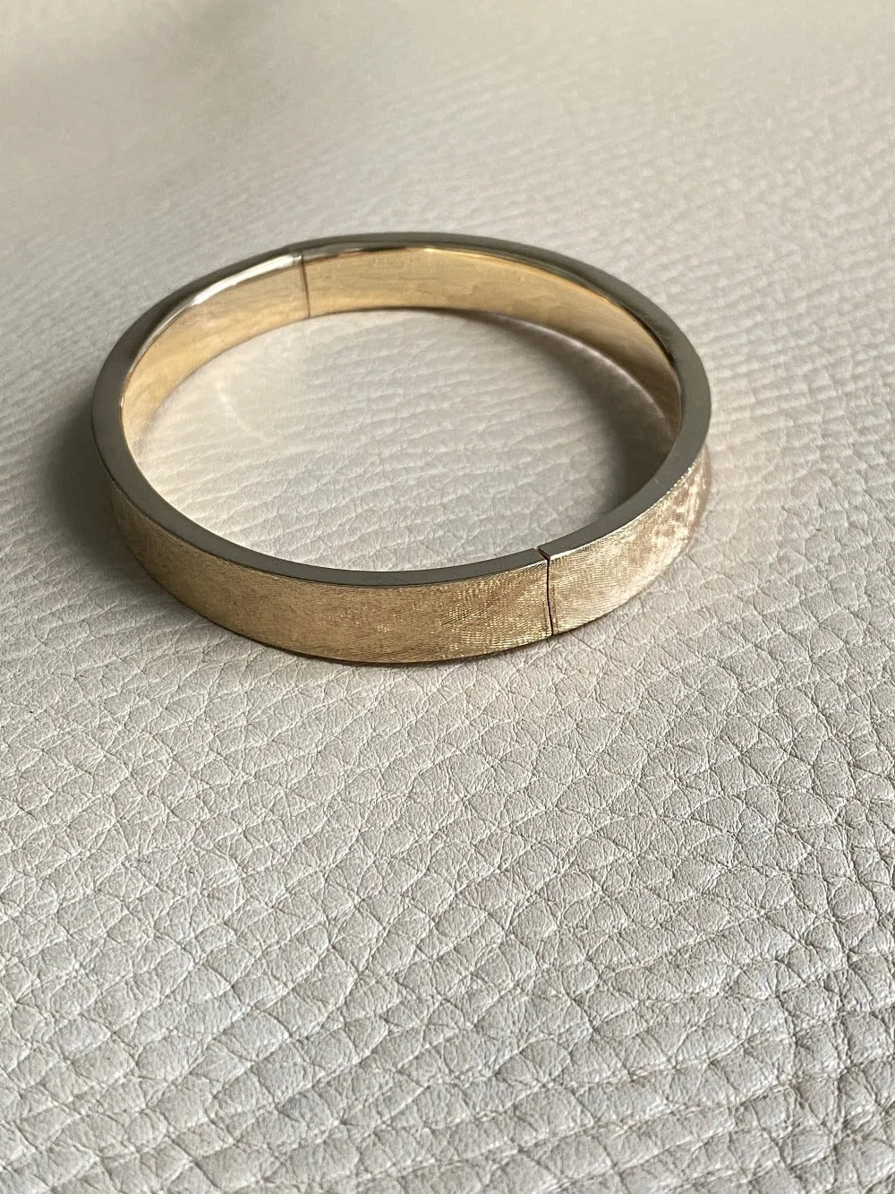 A beauty! 14k gold textured hinged bangle bracelet - 6.9 inch interior