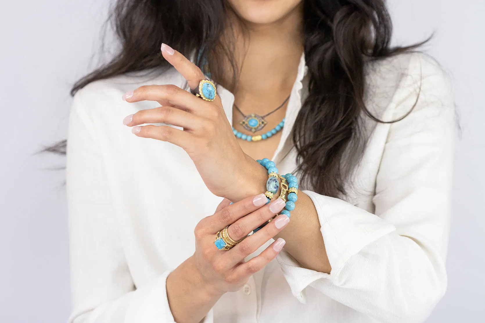 BLUE MAGNESITE WITH GOLD COMPONENT PULL BRACELET
