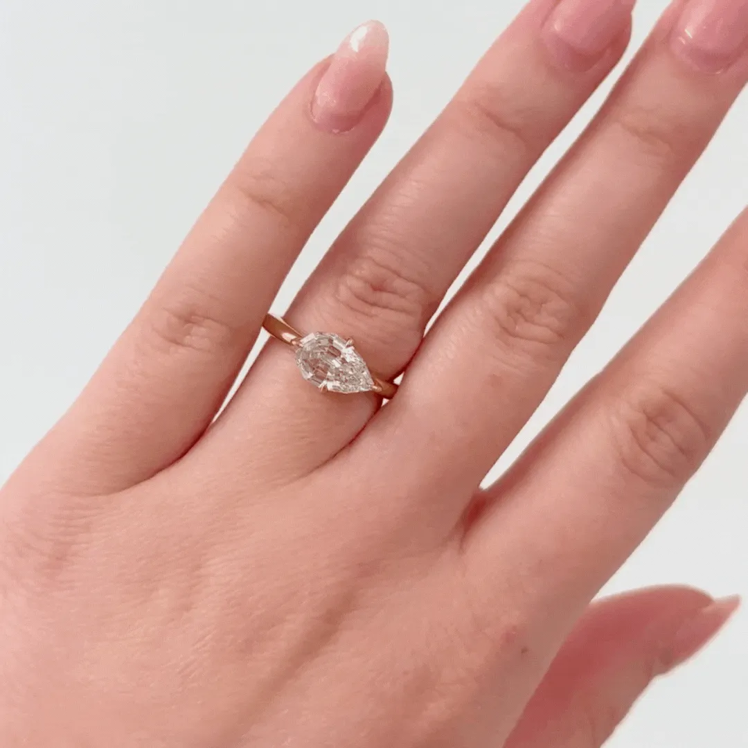 East-West Step Cut Pear Ring