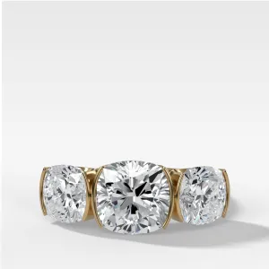 Half Bezel Triad Engagement Ring With Cushion Cut Diamonds