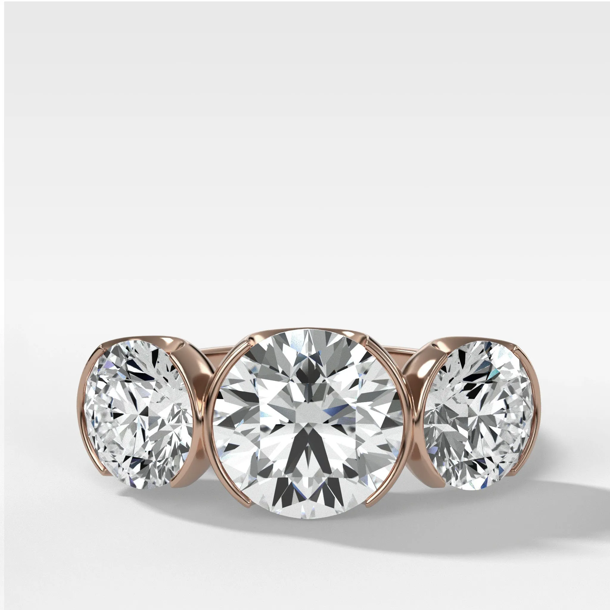 Half Bezel Triad Engagement Ring With Round Cut Diamonds