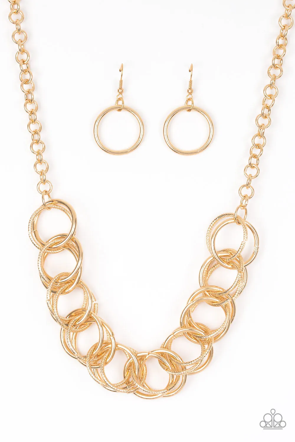 Heavy Metal Hero - Gold - Interlocking Rings Paparazzi Short Necklace