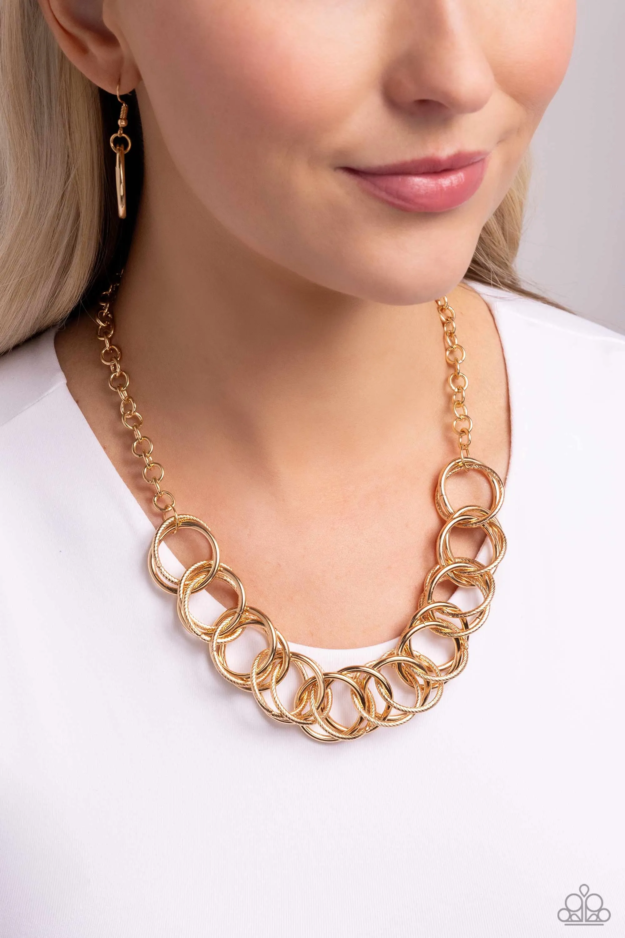 Heavy Metal Hero - Gold - Interlocking Rings Paparazzi Short Necklace