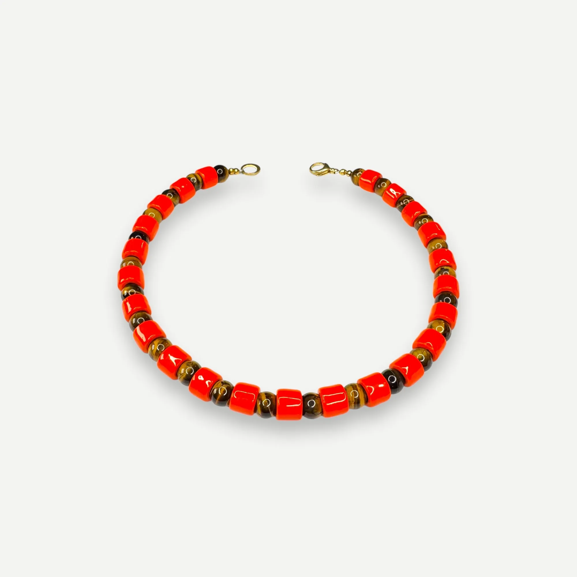 LOBSTER & TIGERS EYE SUNDRY.  BEAD ONE.