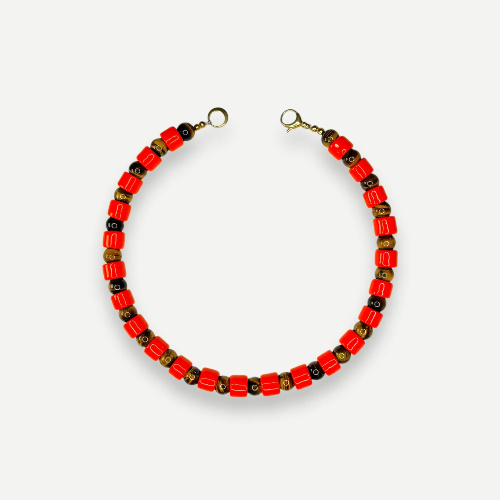 LOBSTER & TIGERS EYE SUNDRY.  BEAD ONE.