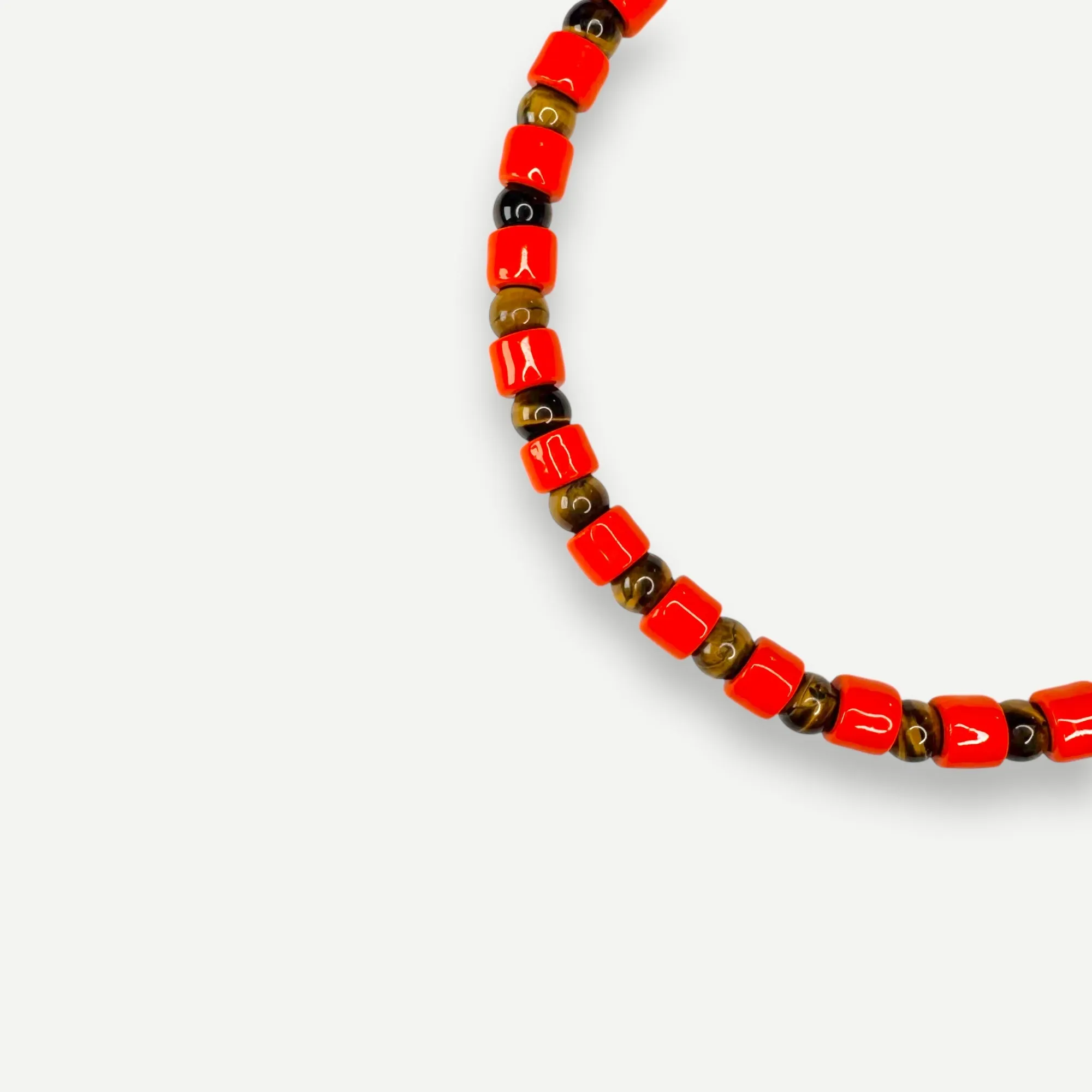 LOBSTER & TIGERS EYE SUNDRY.  BEAD ONE.