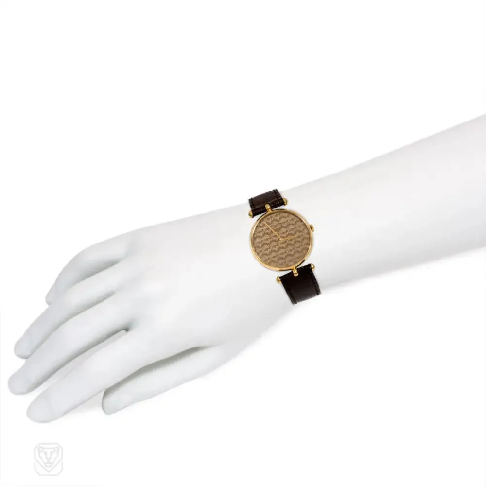 Logo patterned gold wrist watch, Van Cleef & Arpels