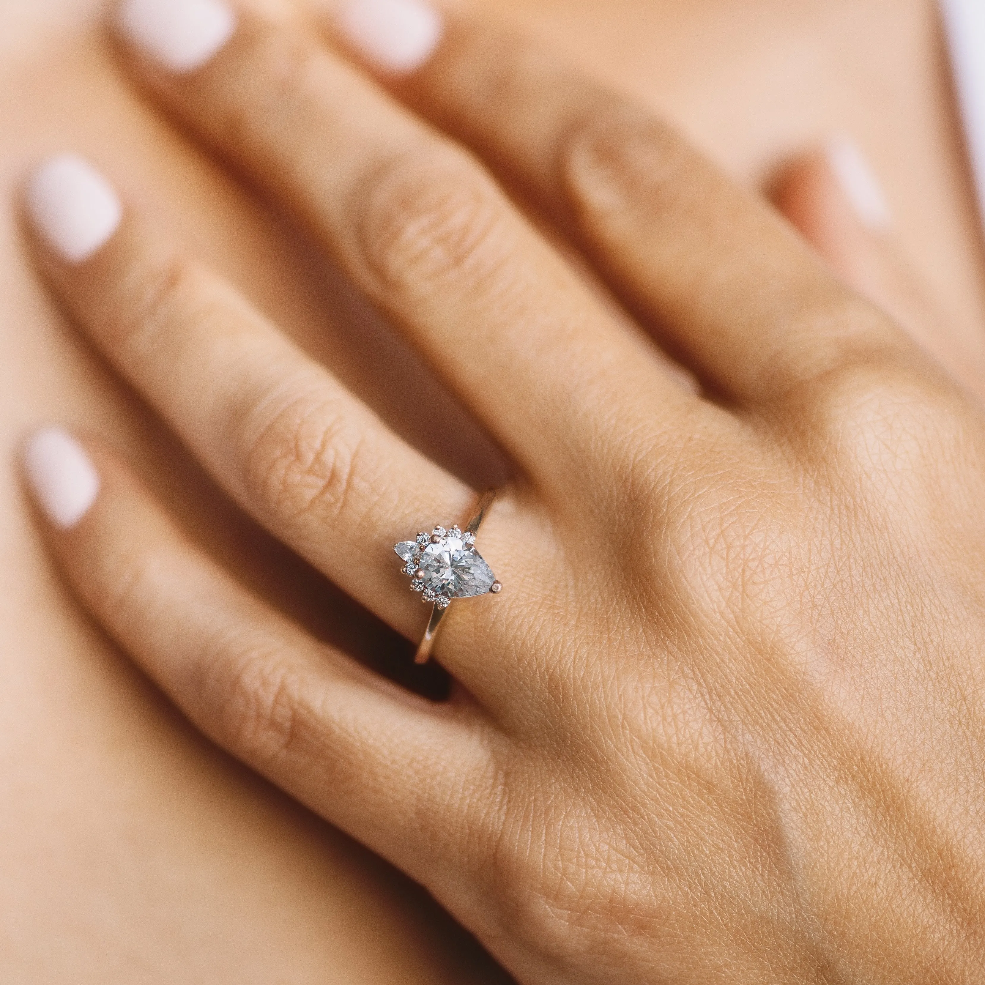 Pear Diamond Half Starburst Halo Engagement Ring