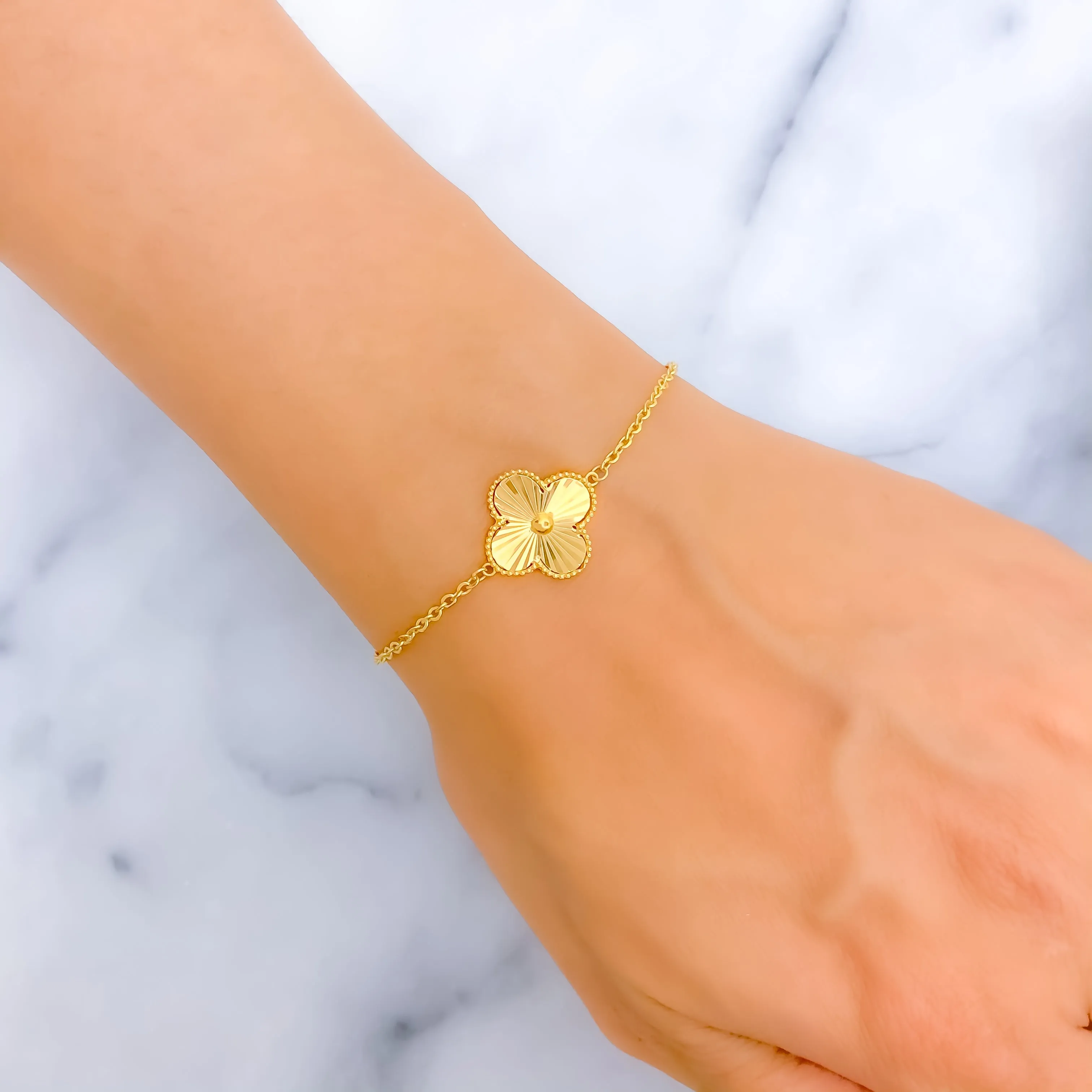 Trendy Tasteful 21k Gold Clover Bracelet