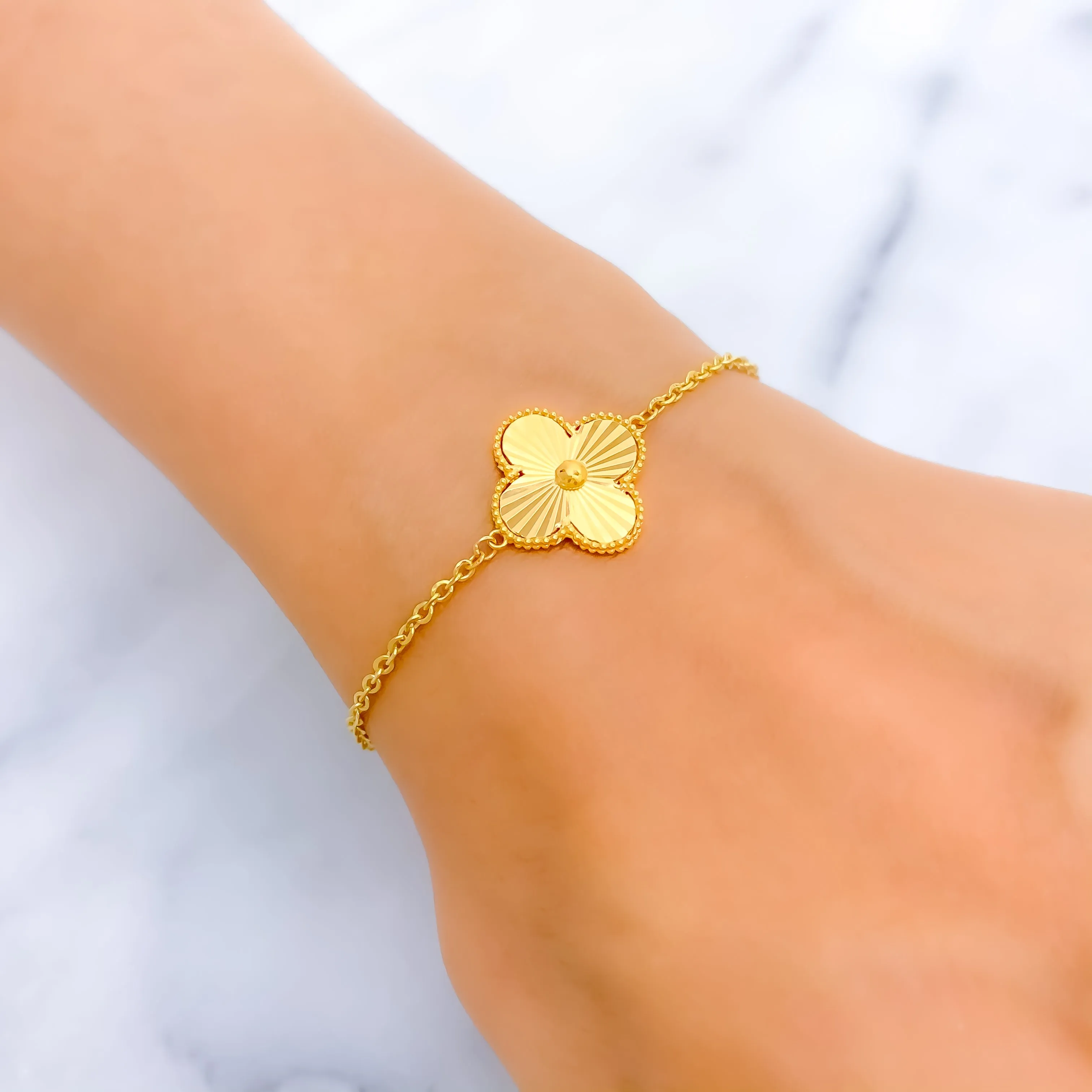 Trendy Tasteful 21k Gold Clover Bracelet