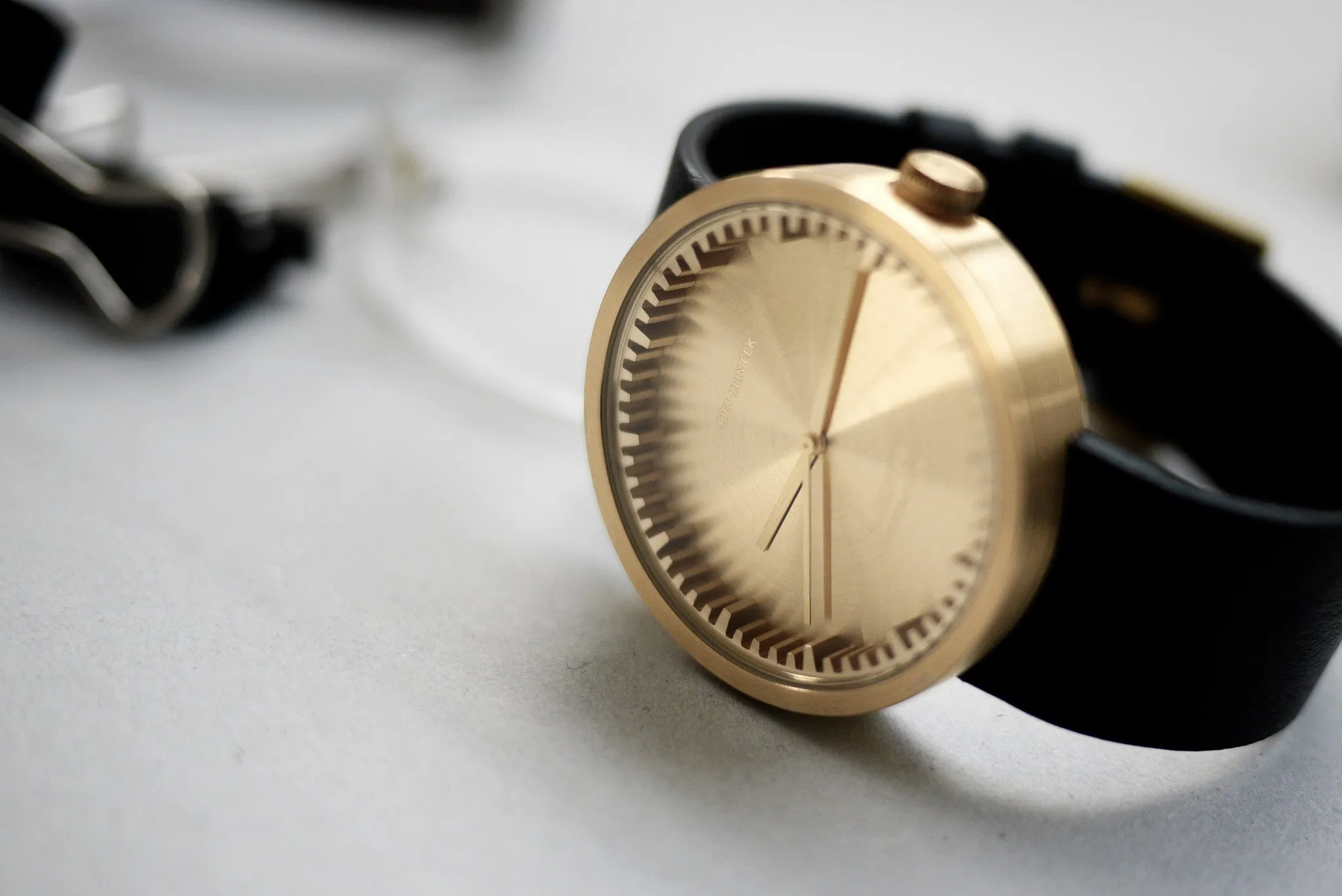 Tube watch D42 brass with black leather strap